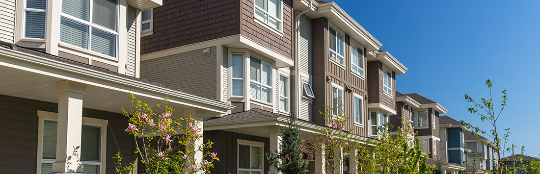 Photo of apartment complex and sky