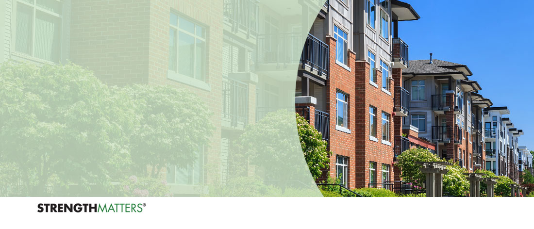 Header with photo of apartment building